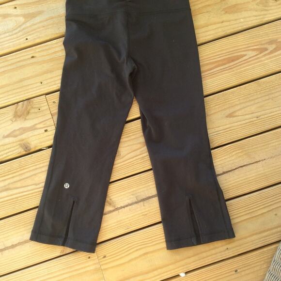 Lululemon Black Flare Crops - Picture 2 of 3